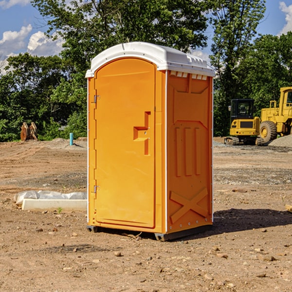 what is the cost difference between standard and deluxe portable restroom rentals in Winnebago